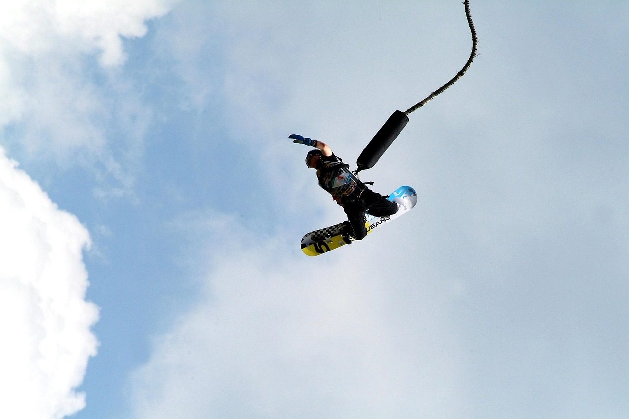 A Person Jumping Using Bungee Jumping Rope