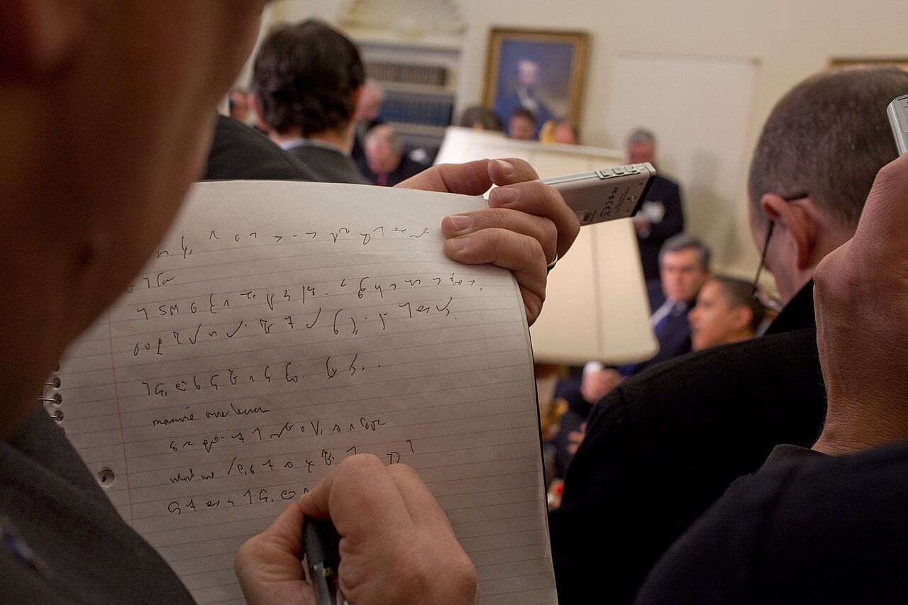 A Person Taking Notes Using Shorthand