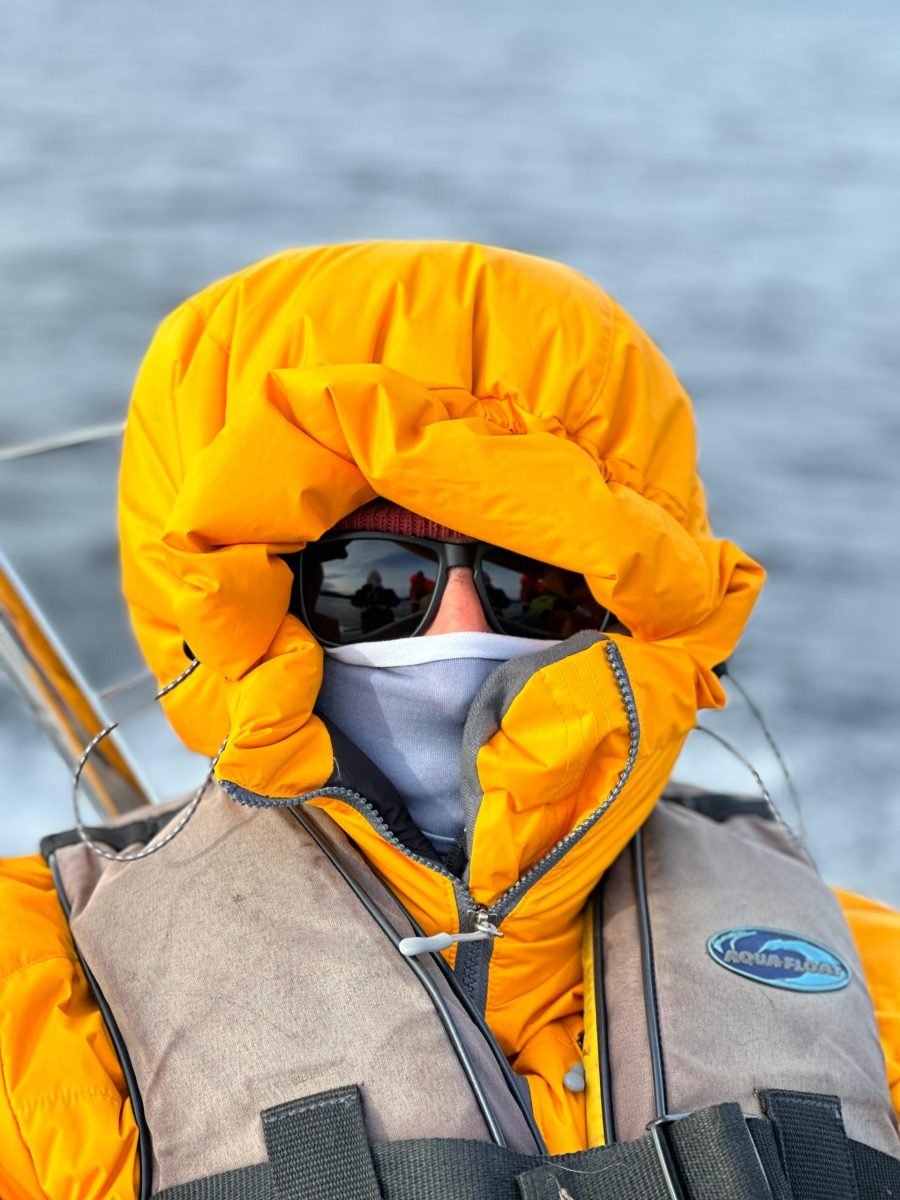 taiki-ishikawa-w6EMxsk8CDA-unsplash Person in bright safety gear on a cold adventure, ready for winter exploration.