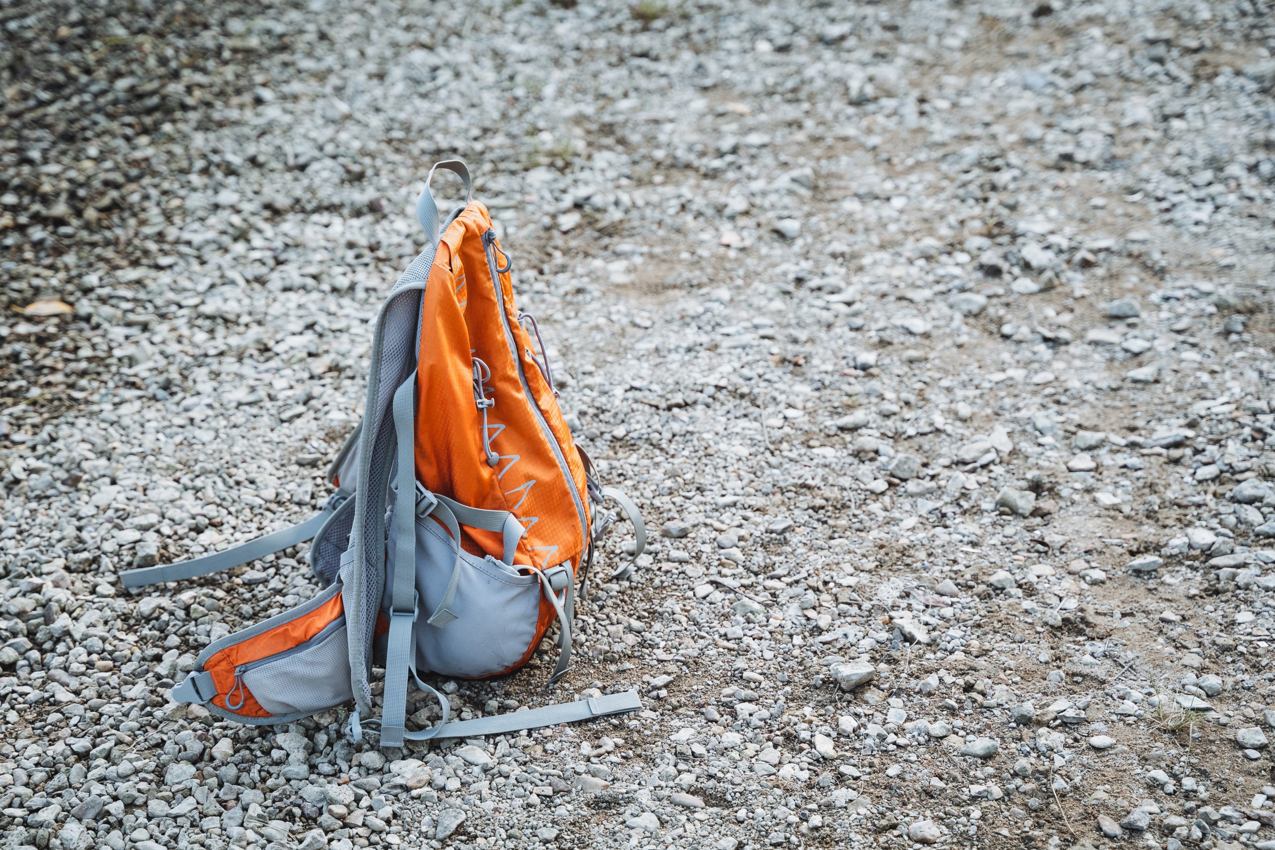 An orange and gray backpack
