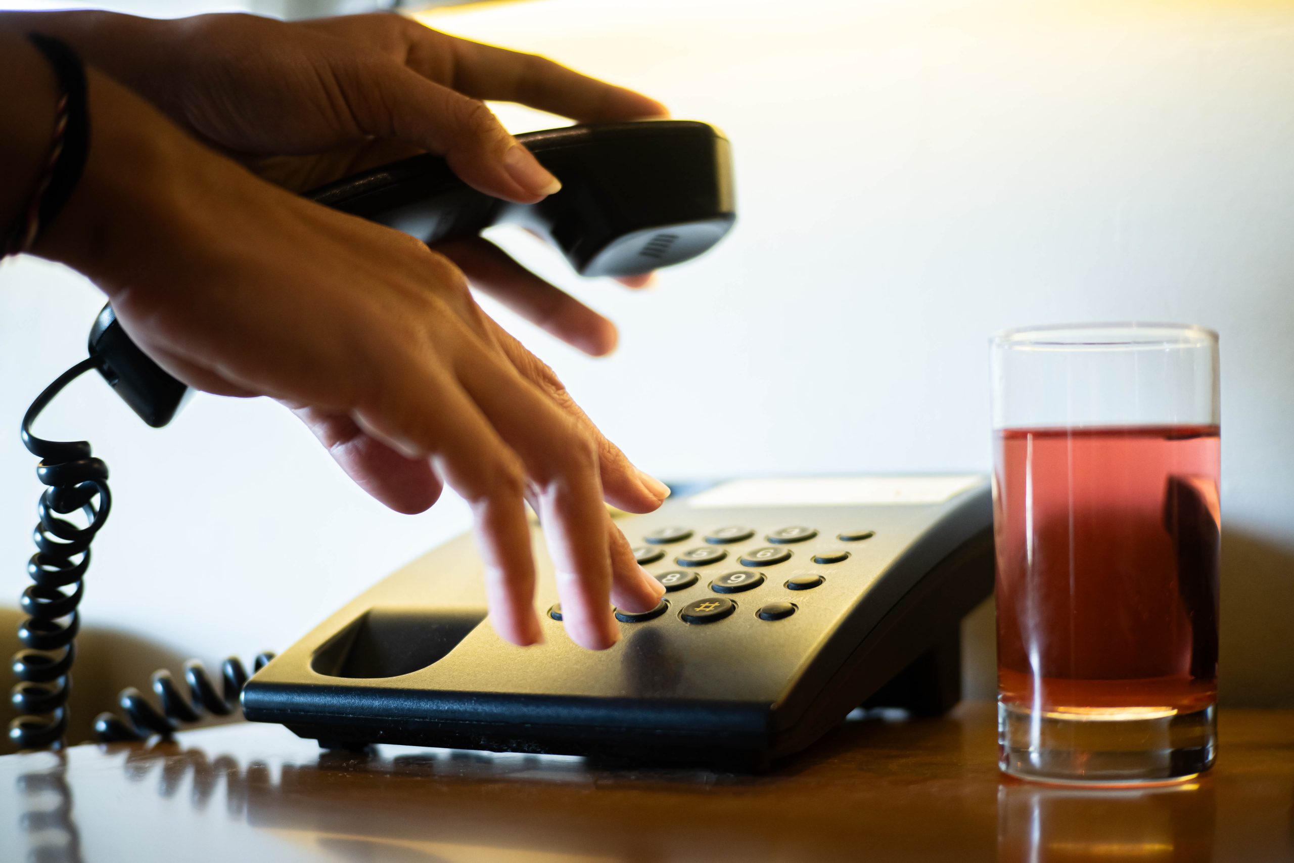 A Person Using Landline