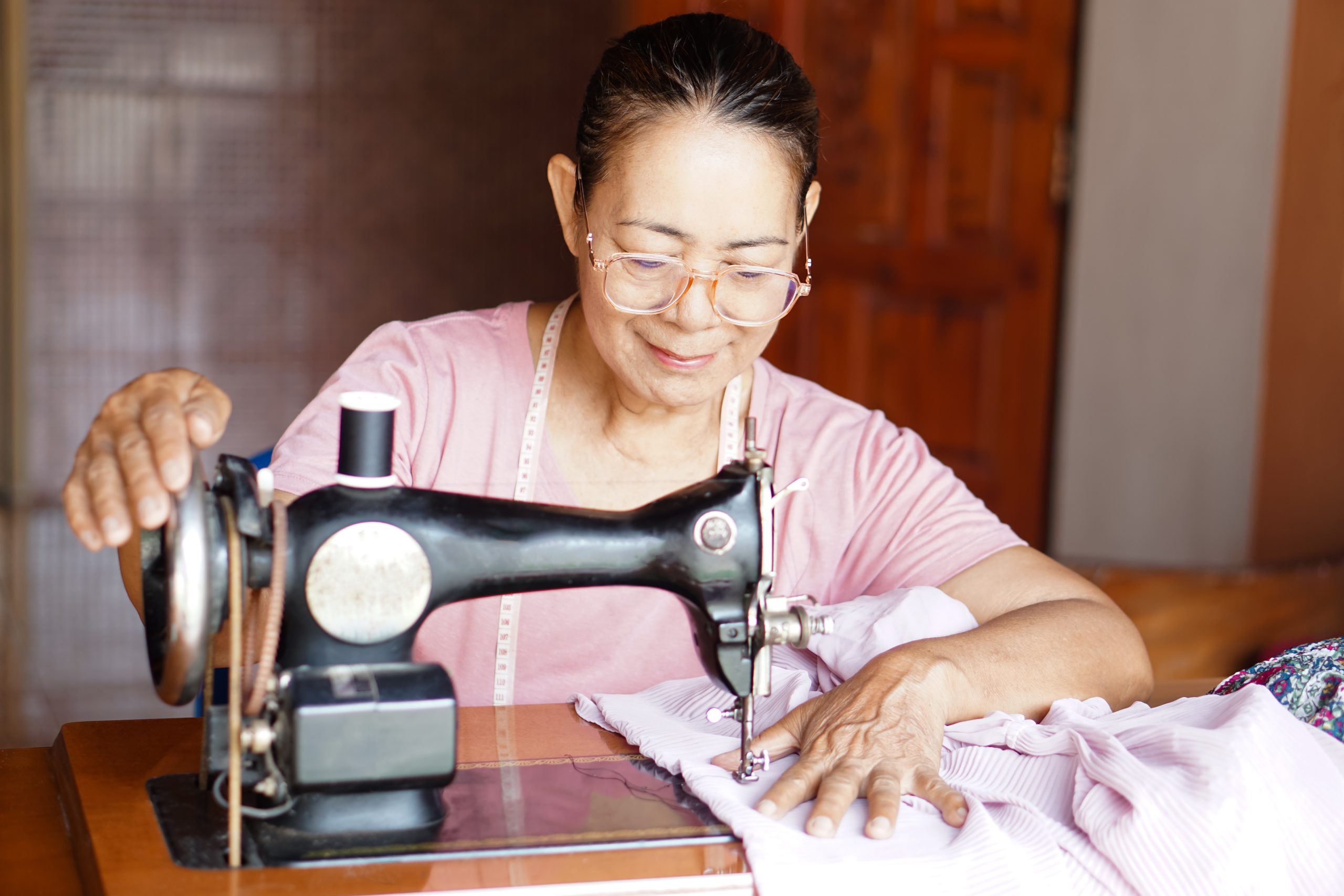 Old Women Sewing at Home