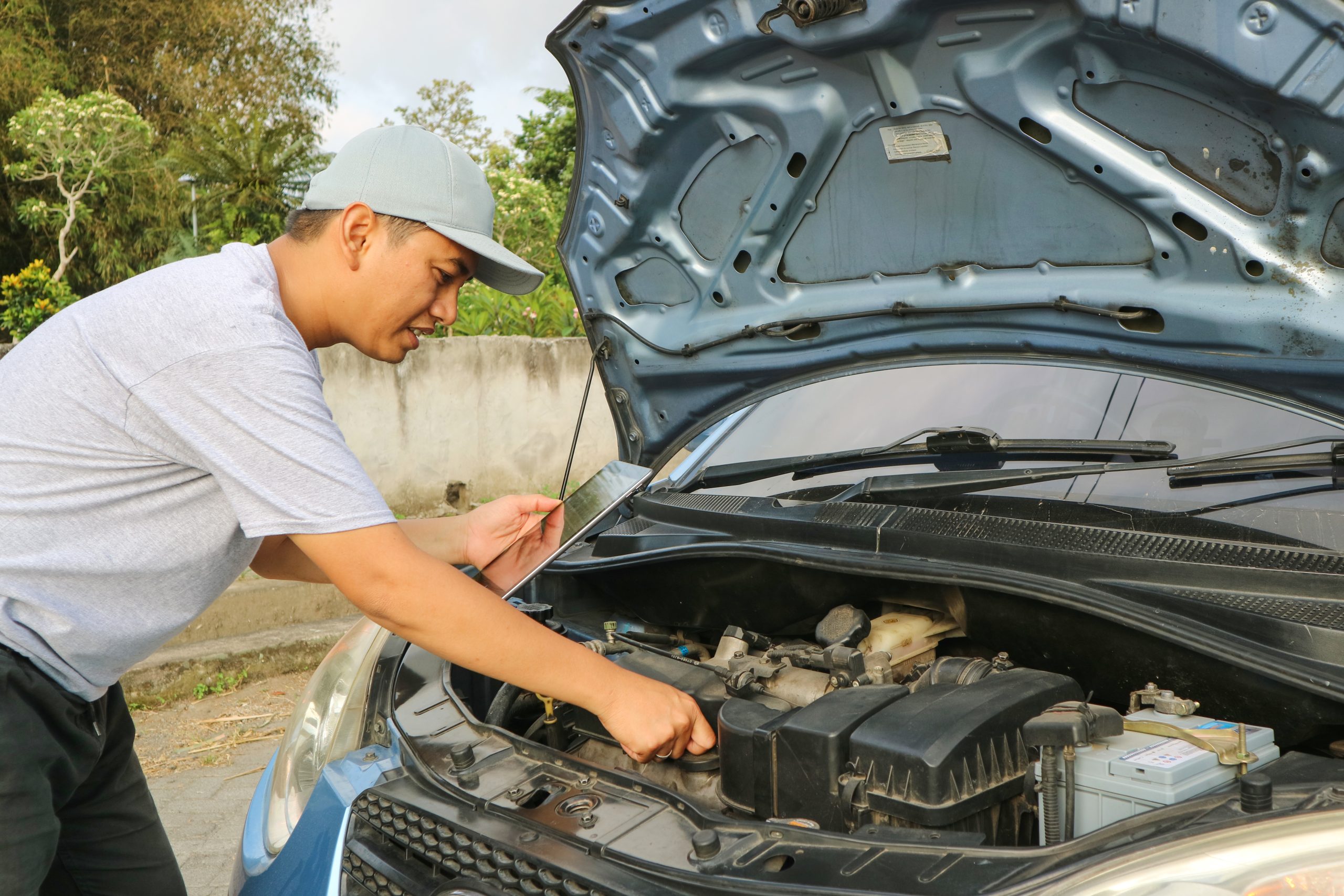 A Person Maintain his Car