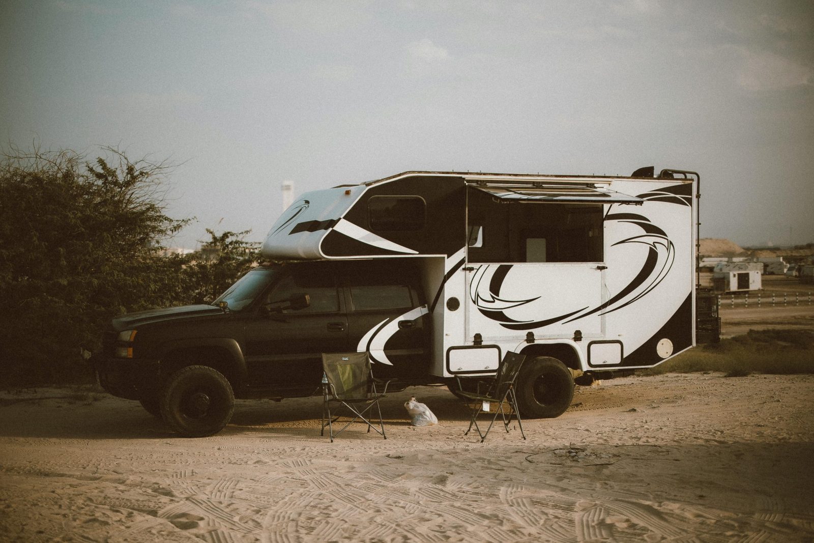 RV parked desert, ideal for adventure camping and outdoor travel.