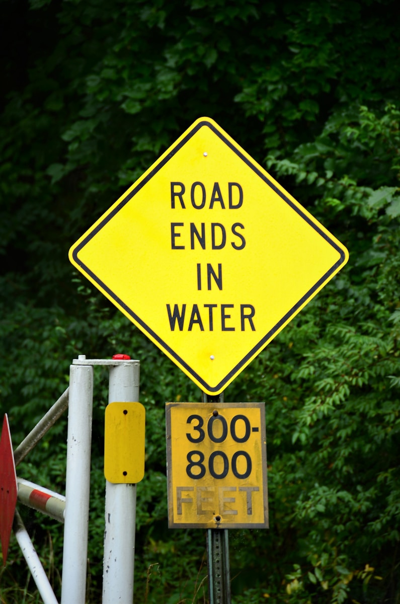 Road Ends in Water Sign