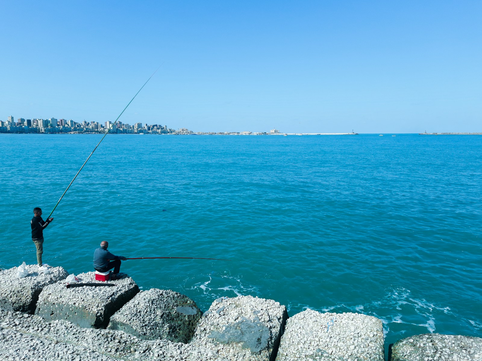 taiki-ishikawa-w6EMxsk8CDA-unsplash Fishing on the beach of Alexandria in Egypt
