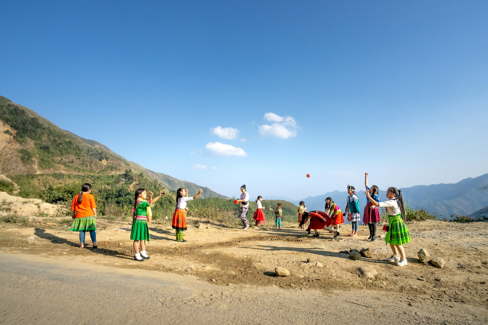 Kids Playing with Water Balloon Toss in Campground