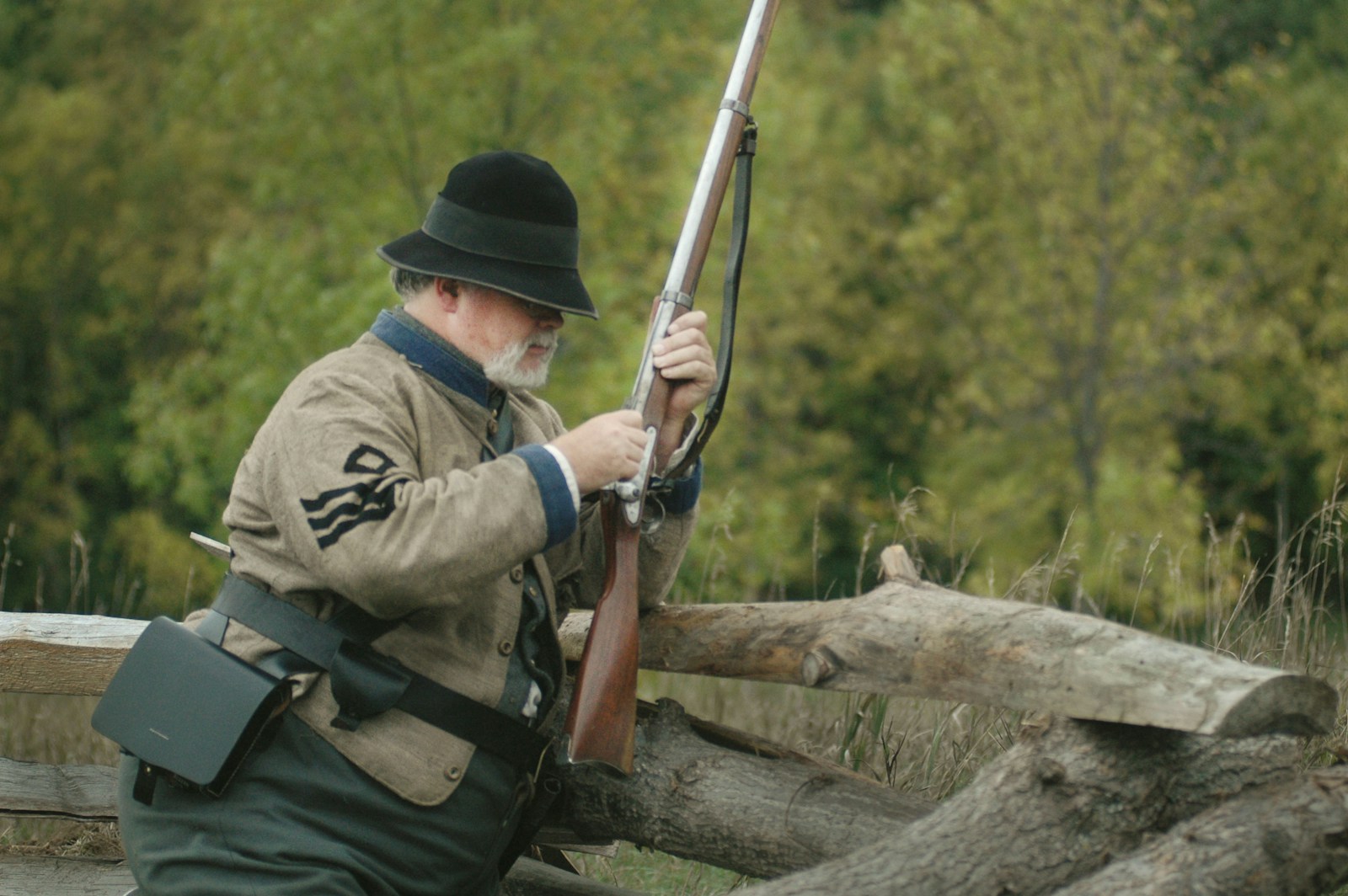 A Man Using a Bolt Action Rifle