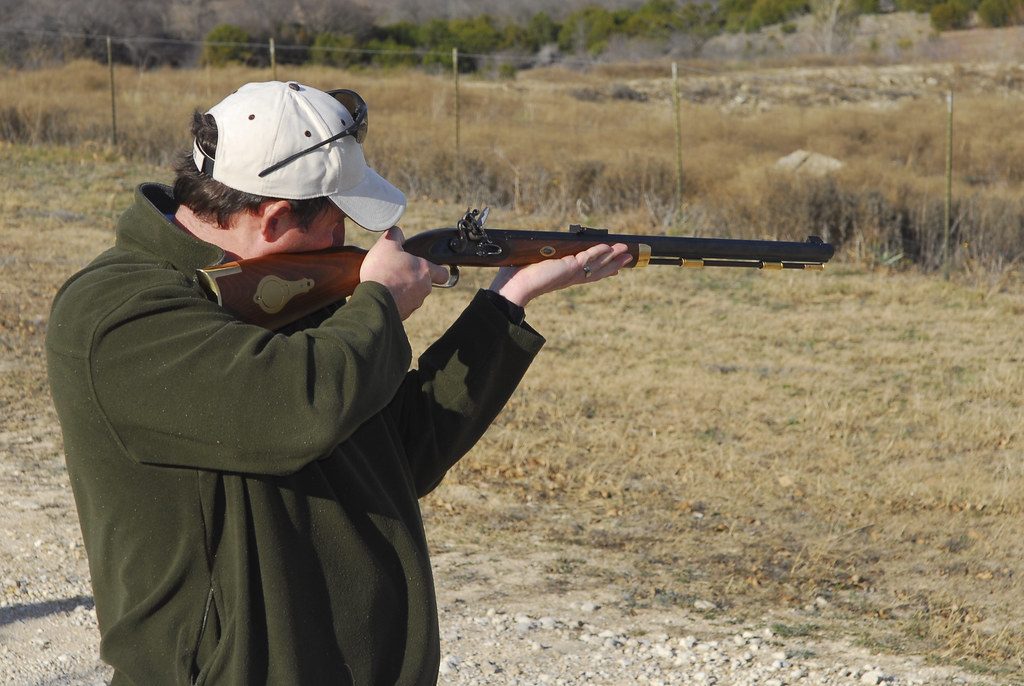 A Person Aiming a Hawken Rifle