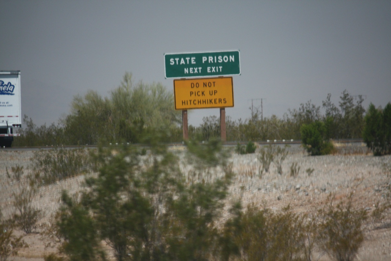 Hitchhikers May Be Escaping Inmates, Arizona Road Sign