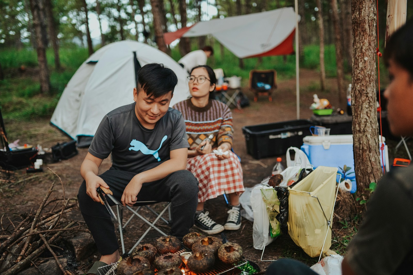 Sharing a Communal Camp Pot During Camping