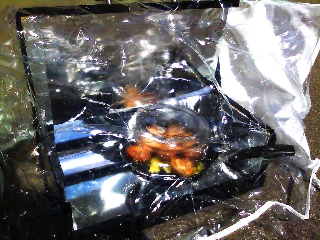Solar Cooker Wrapped in Transparent Vinyl Cover