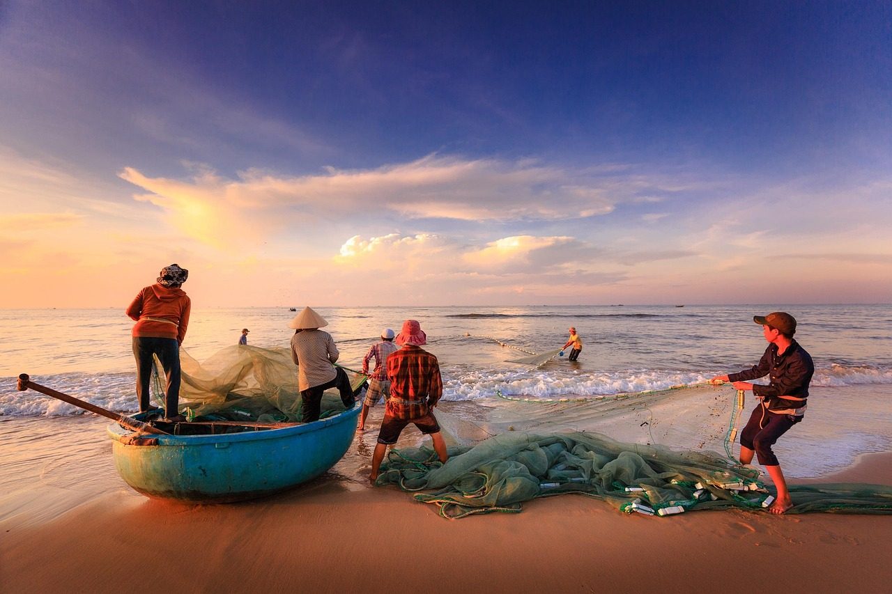 Fishermen Fishing in Deep Sea Shore