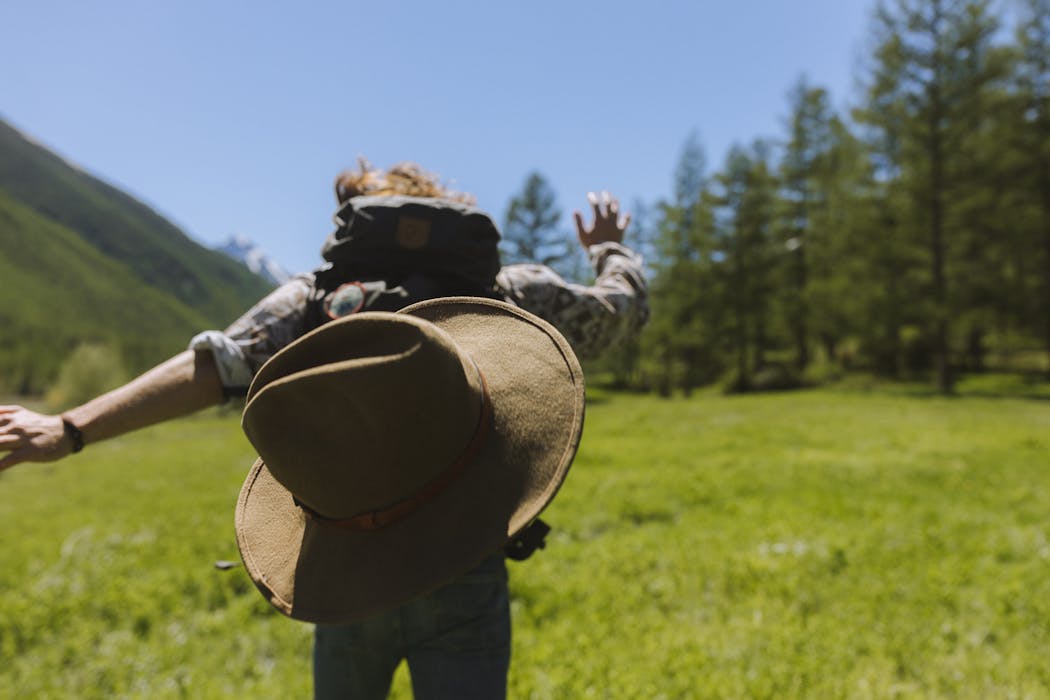 Man Running on Grassland