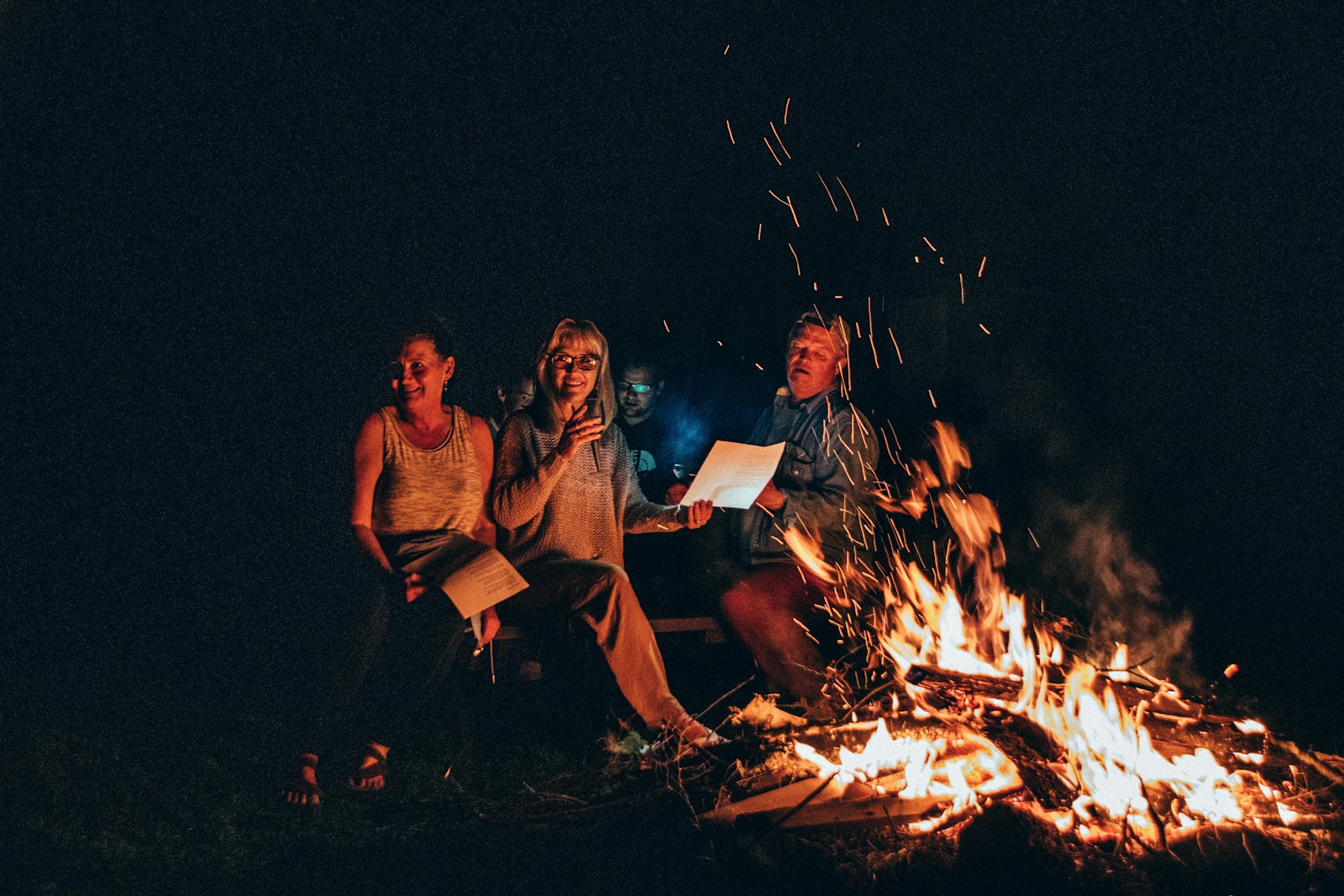 Writing in a Camp Journal During the campfire