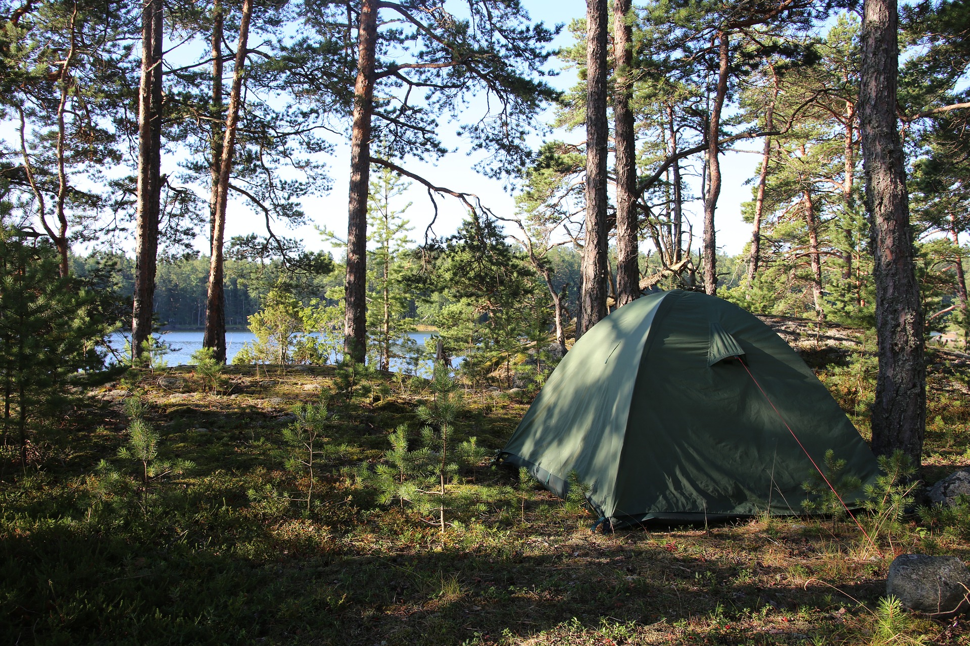 A Green Tent Near a River