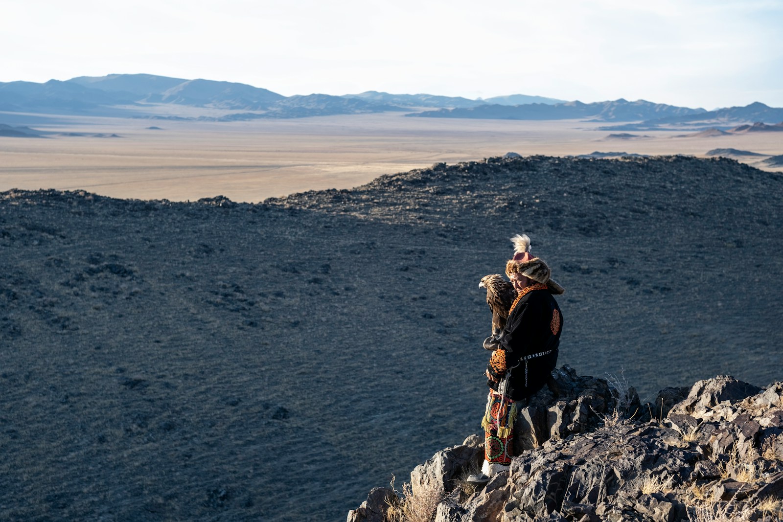 A Hunter Holding his Eagle Hunting in Mongolia