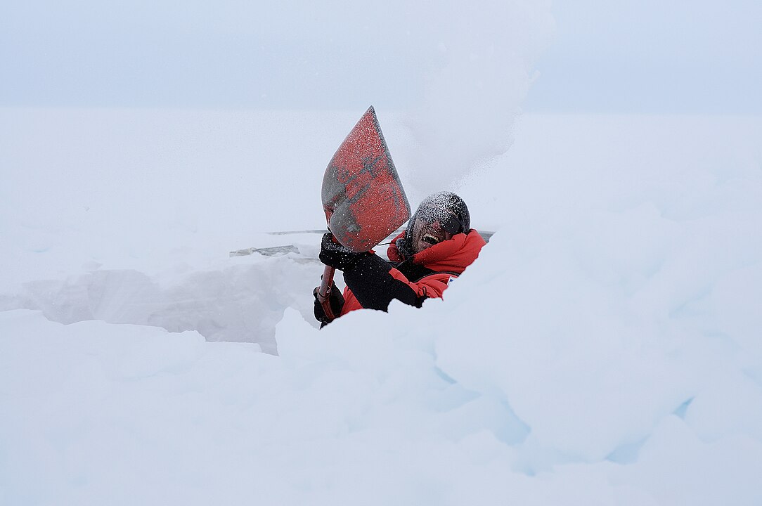 A Person Making Snow Cave