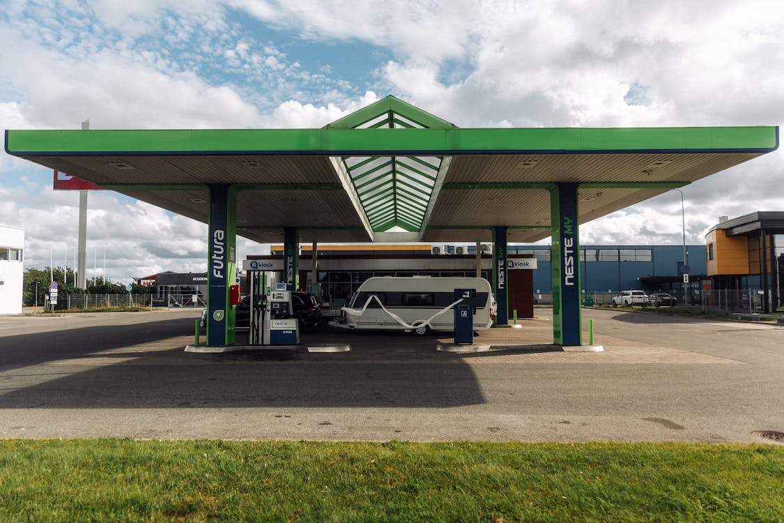 Modern Gas Station with Camper Van