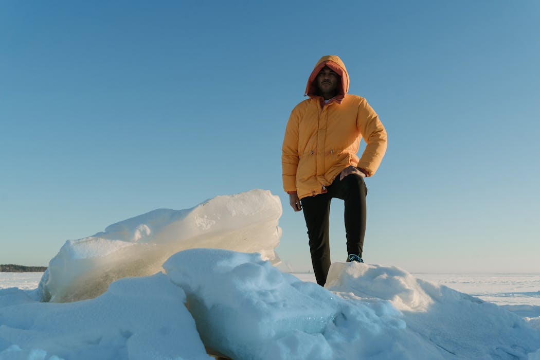 A Person Wearing Thermal Base Layers and Cloths on Top of it