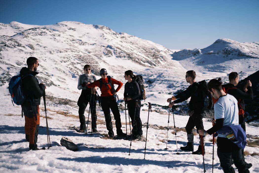 Hikers on Snowy Mountain