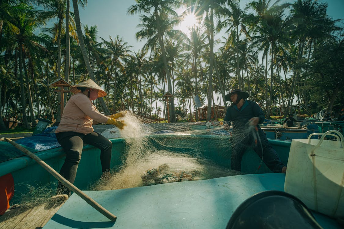 Fishermen Fixing Fishnet