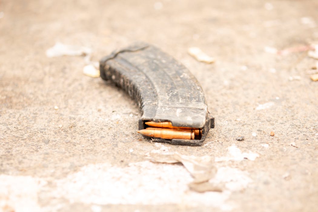 Close-up Image of Rifle Magazine on Ground