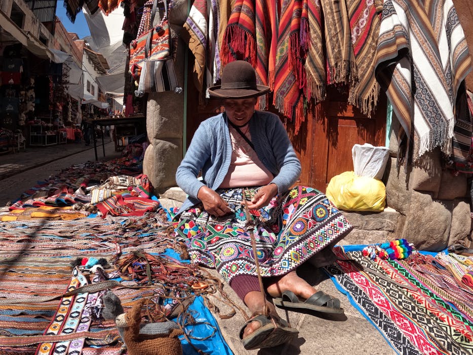 Traditional Textile Vendor in a Vibrant Market