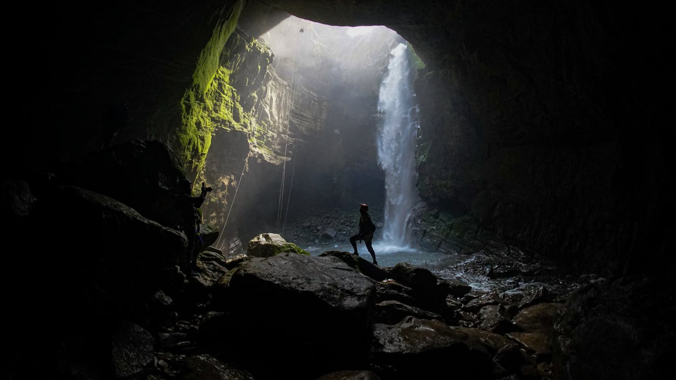 Person Posing in Cave
