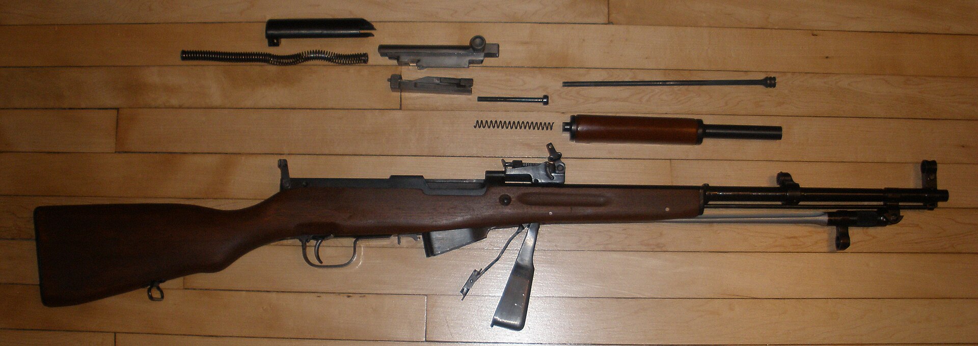 A field-stripped SKS carbine
