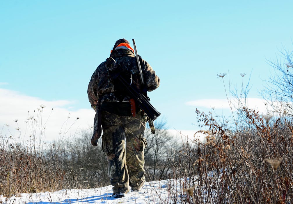 Snow Obstructing Barrels of Hunter Rifle in Cold Weather