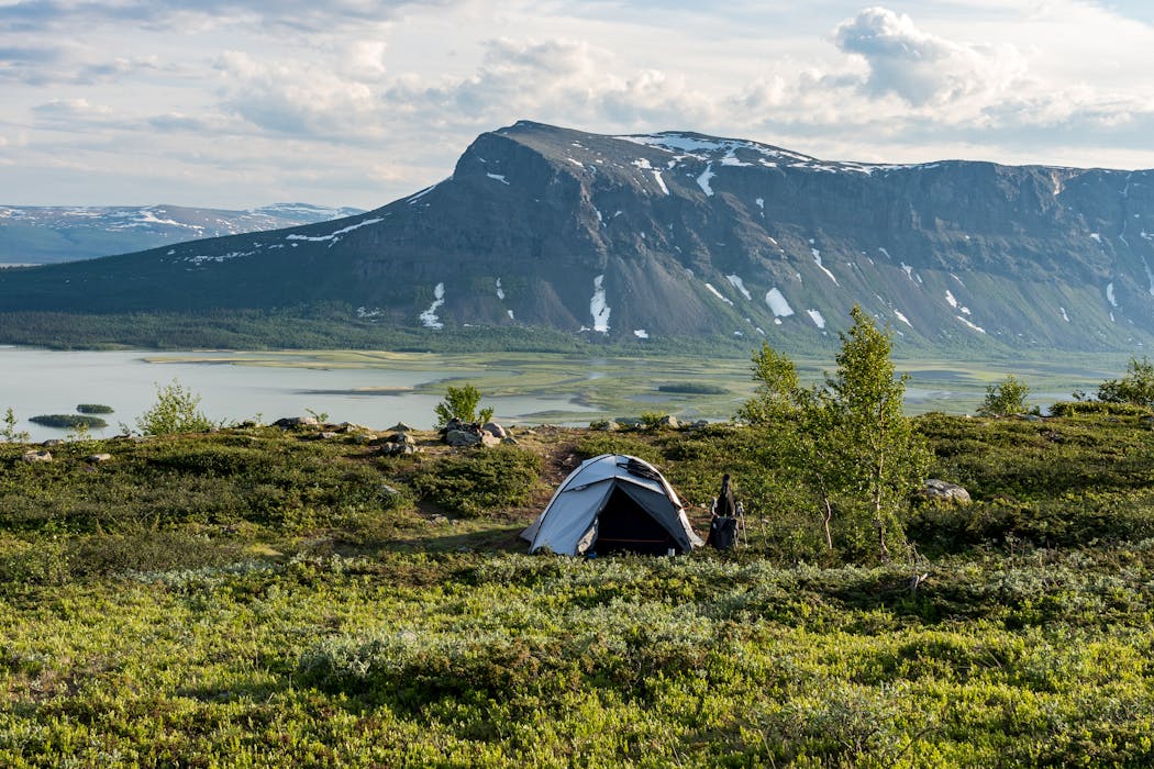 taiki-ishikawa-w6EMxsk8CDA-unsplash White Dome Tent on Green Grass