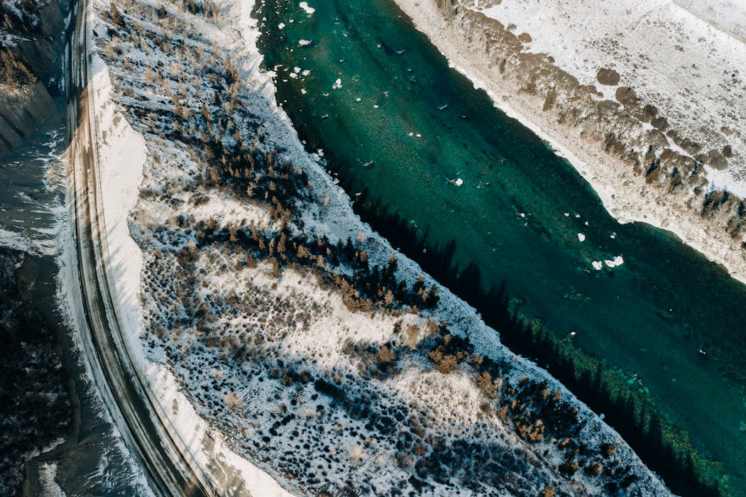 taiki-ishikawa-w6EMxsk8CDA-unsplash River Flowing After Snow Melt