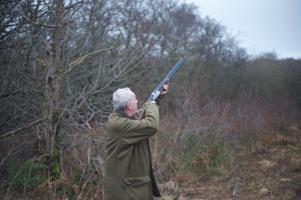 taiki-ishikawa-w6EMxsk8CDA-unsplash Hunter with Shotgun