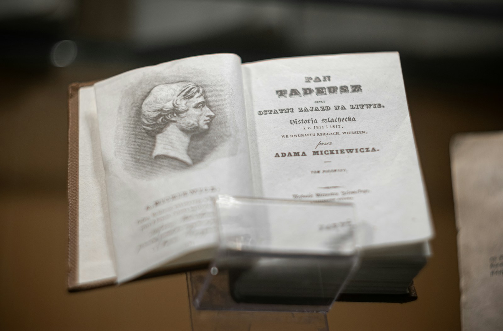 an open book with a picture of a woman on it