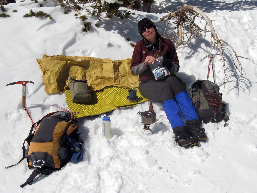 A Hiker with extra gear items