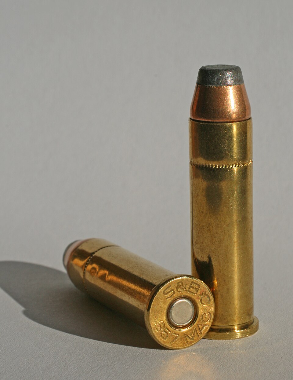 Two .357 Magnum cartridges showing bottom and side views