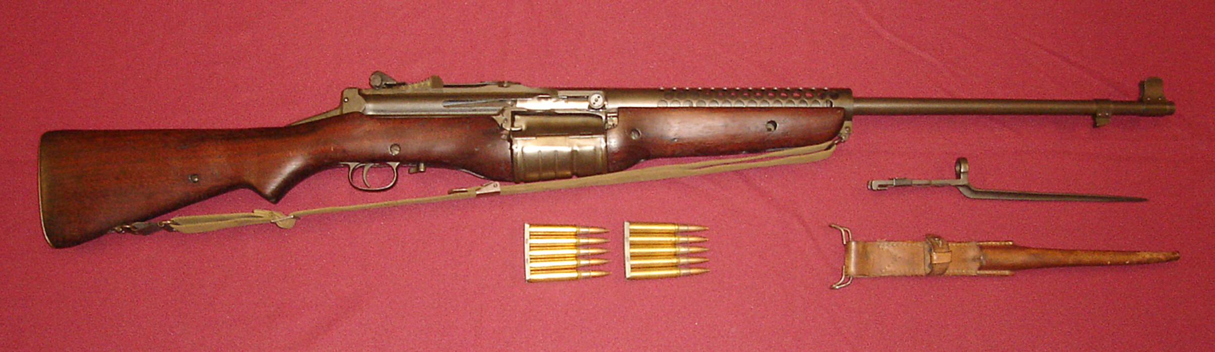 Johnson M1941 Semi-Automatic Rifle with original spike bayonet and leather sheath