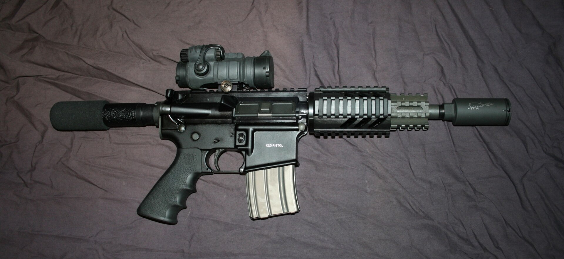 his AR-15 style–pistol has a shorter barrel and has no buttstock.
