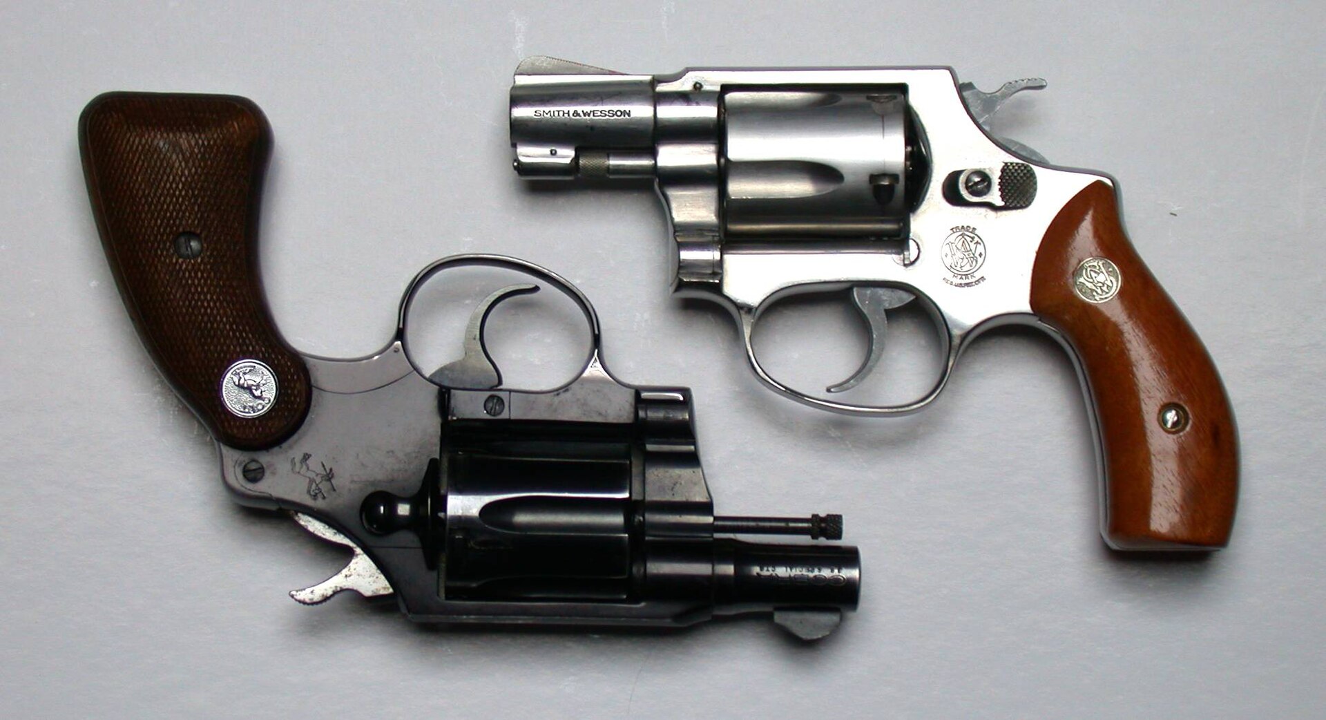 A Colt Detective Special and a Smith & Wesson Model 36 snubnosed revolvers