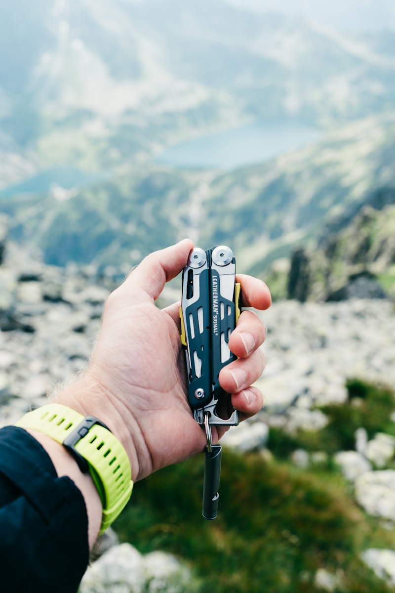 A person holding a multi-tool